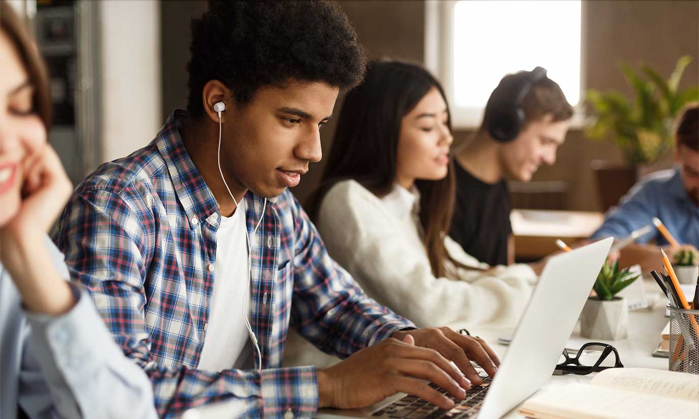 Students working online in class